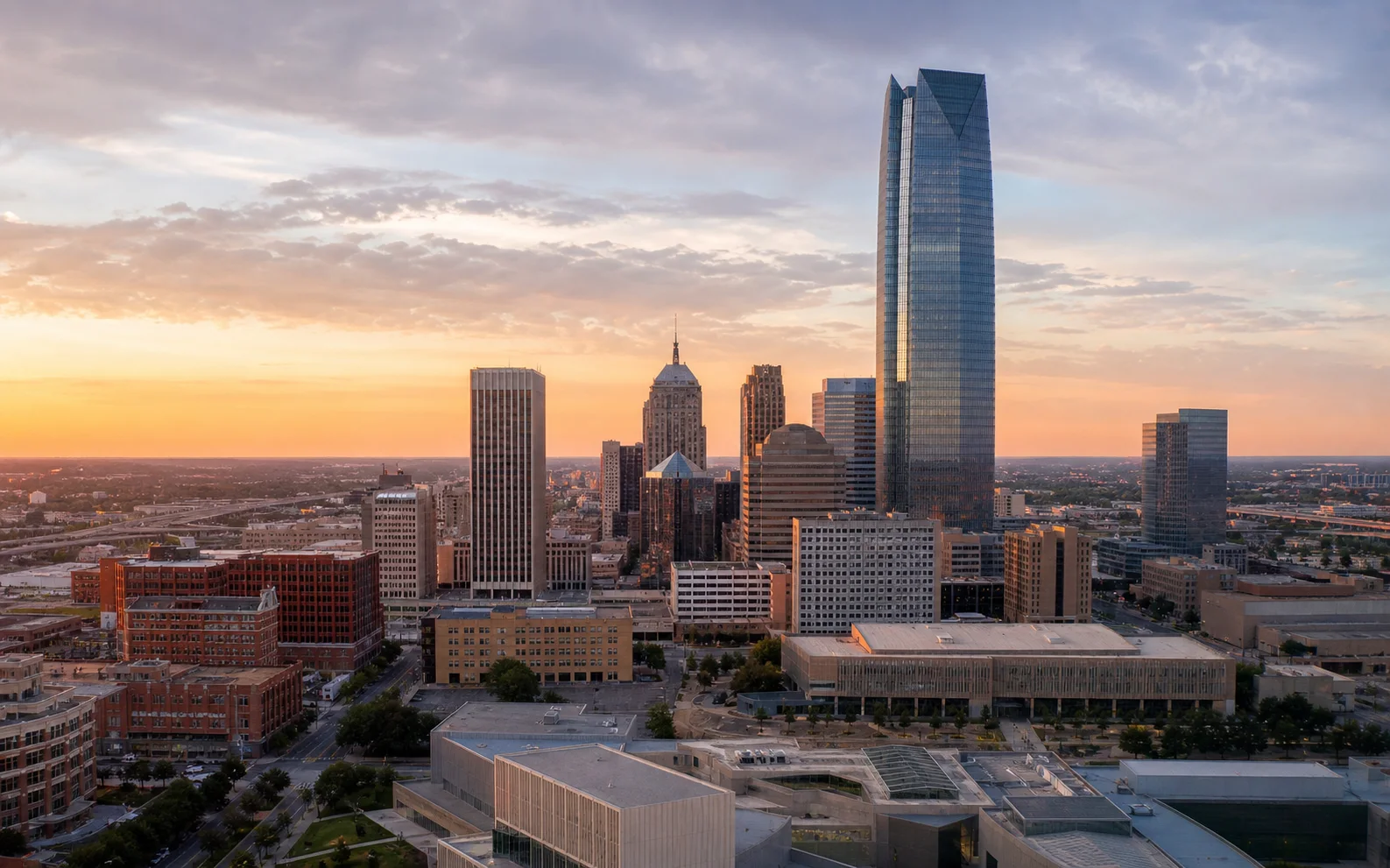 The downtown Oklahoma City skyline in warm morning light.
